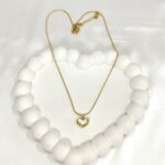 Gold heart pendant necklace for women