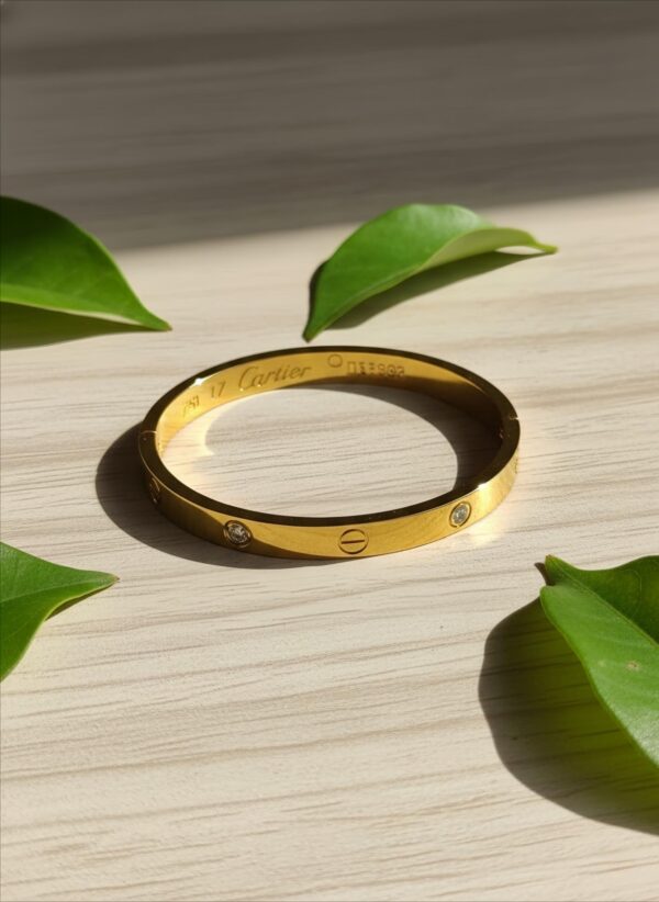 Minimal gold plated screw design bracelet for women with crystal studs